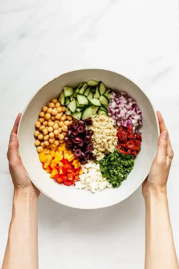 Making it Stick: Tossing Your Quinoa Salad with Mediterranean Dressing