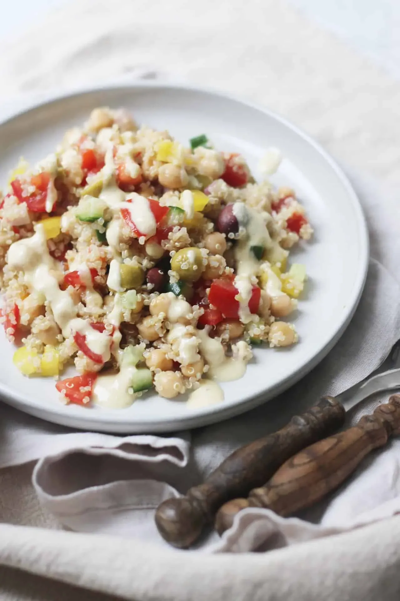 Delicious mediterranean quinoa salad with hummus dressing